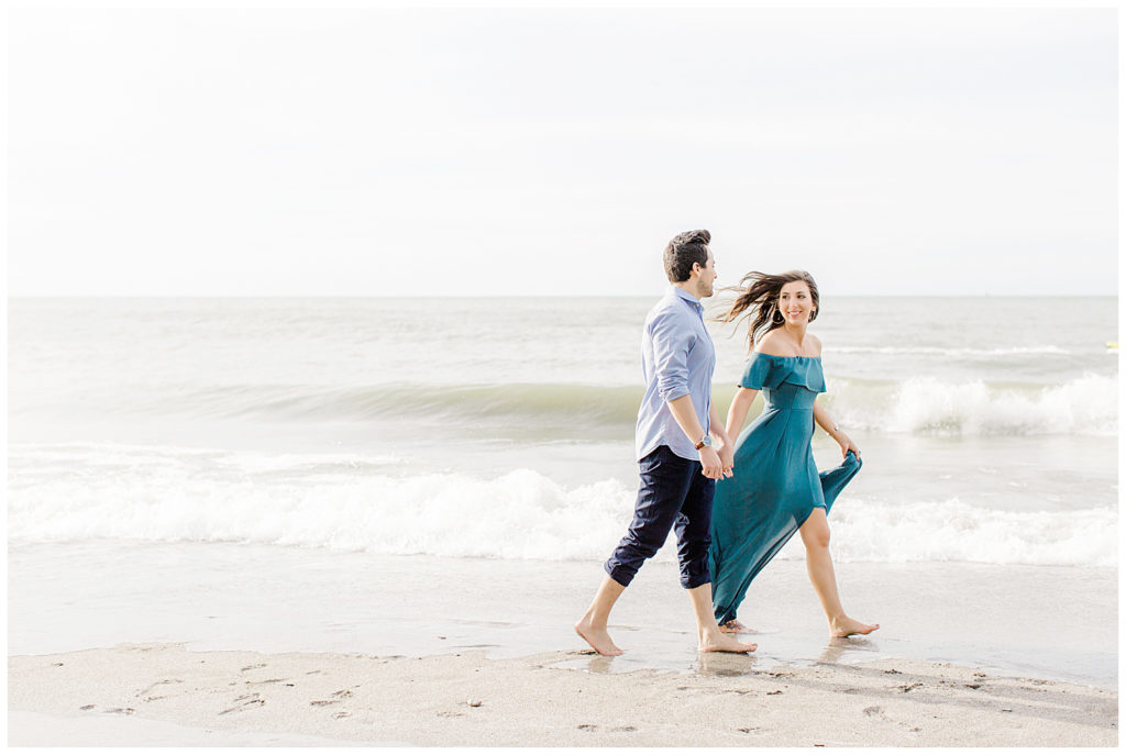 Casie_Contos_Tyler_Karras_Cleveland_Engagement_Edgwater_Park_Beach_Lake_Erie_The_Flats_Kate_Mannella_Photography